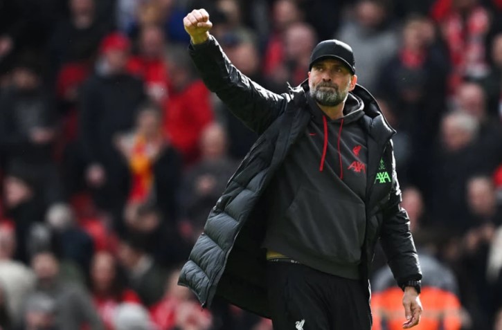 Liverpool's German manager Jurgen Klopp celebrates at the end of the English Premier League football match between Liverpool and Brighton and Hove Albion at Anfield in Liverpool, north west England on March 31, 2024. Liverpool wins 2 - 1 against Brighton and Hove Albion.